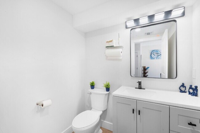 Building Photo - Movie in special, first 1/2 month rent is FREE! Charming 2-Bedroom Condo with 2 Full & 2 Half Bat...