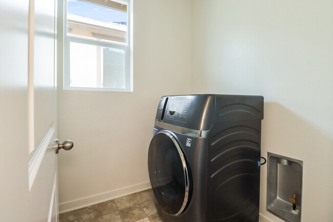 Laundry room with washer/dryer combo unit - 3092 Acebo Dr