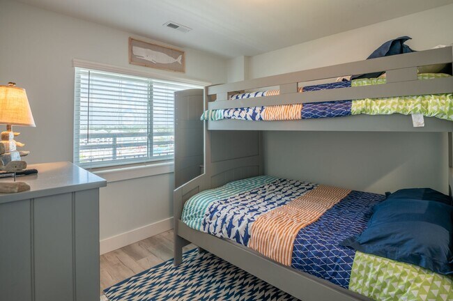 Building Photo - SPEND YOUR OFF-SEASON AT THIS TOP FLOOR OCEANFRONT CONDO