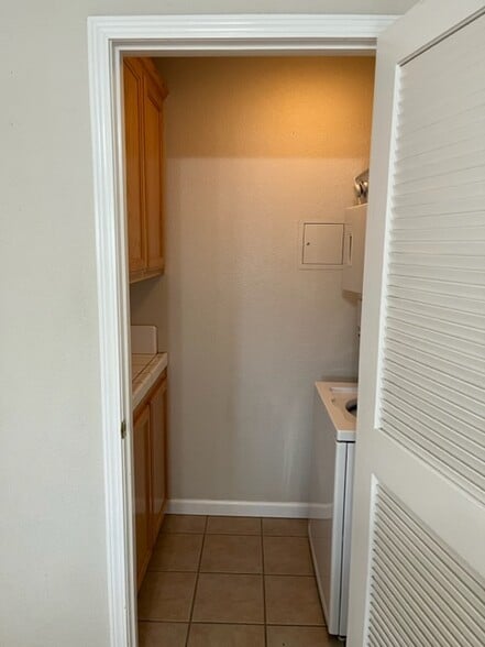 Laundry Room with Counter and Storage - 1600 Park Ln