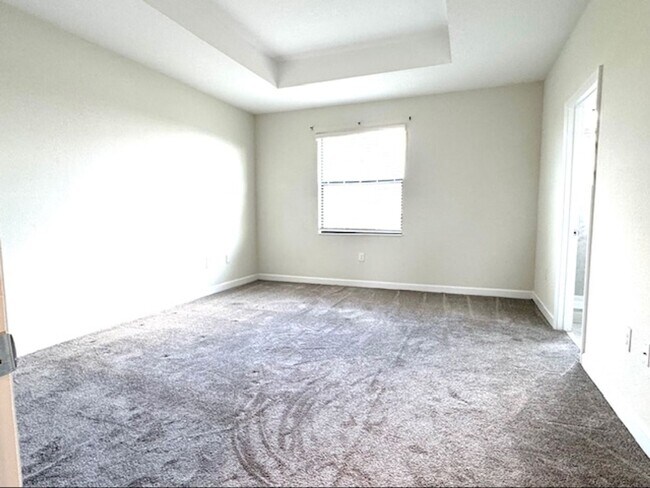 Building Photo - For Rent in ChampionsGate 3/2.5 Townhouse with Water View