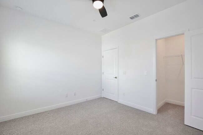 Building Photo - Stunning 3/2.5 Modern Townhome with a Priv...