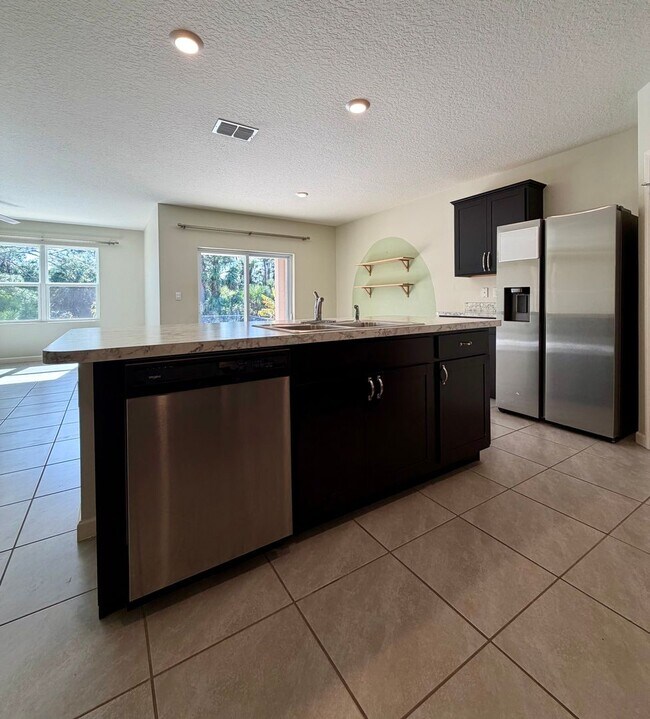 Building Photo - Palm Bay Pool Home Stunner!