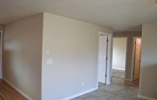 Building Photo - Three bedroom, two bath house less than 5 ...