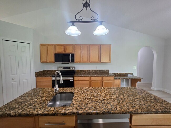 Building Photo - Beautiful 4 Bedroom in Gated Compass Pointe