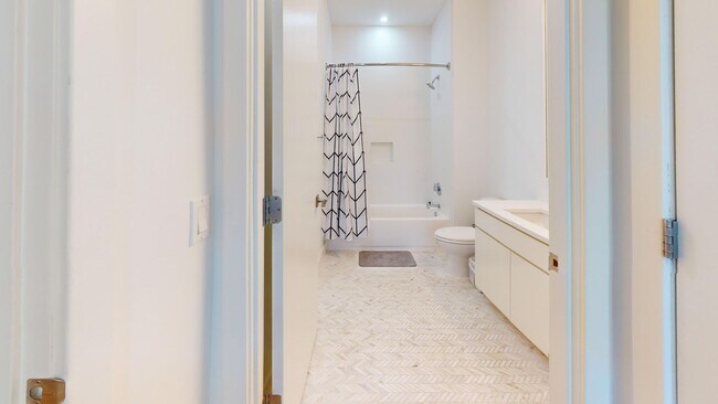 Building Photo - Stunning Fully Furnished Capitol Hill One Bedroom W/Parking Included!