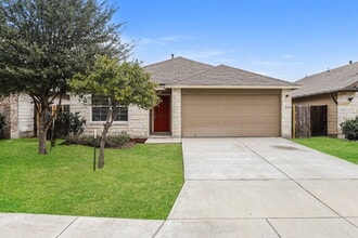 Building Photo - "Charming 4-Bed Sanctuary on Live Oak Pass with Modern Granite Finishes!"