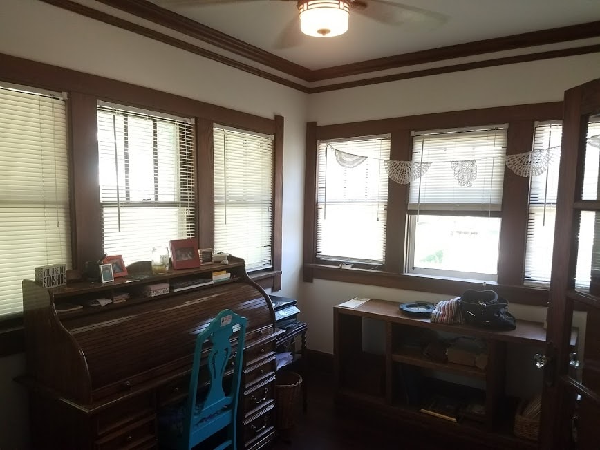 4 season porch on the front of the home - 1801 E 12th St