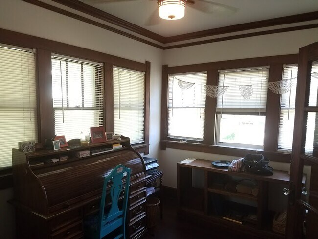 4 season porch on the front of the home - 1801 E 12th St