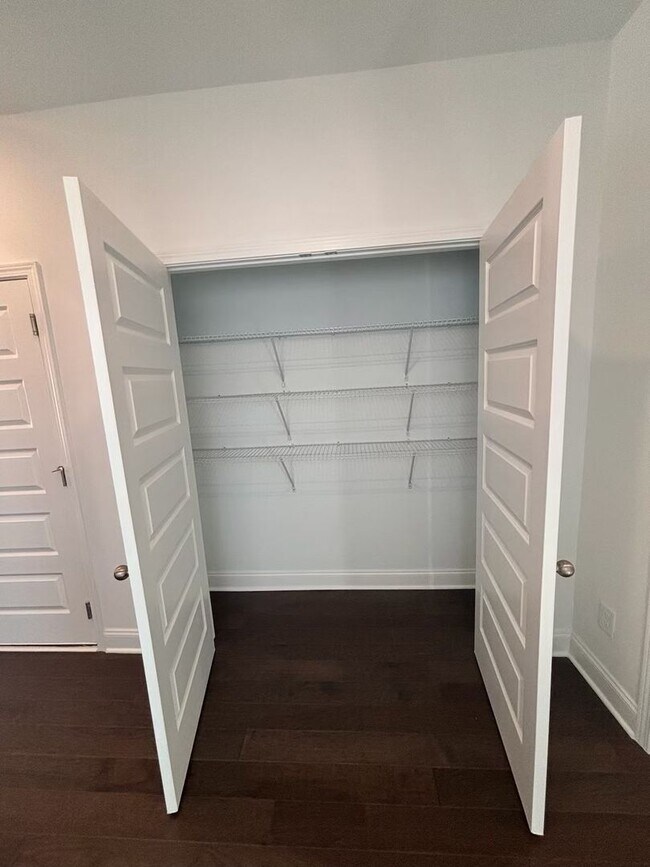 Building Photo - **BE THE LUCKY ONE TO LIVE IN THIS 2024-BUILT END-UNIT TOWNHOME IN A RESORT-STYLE COMMUNITY**