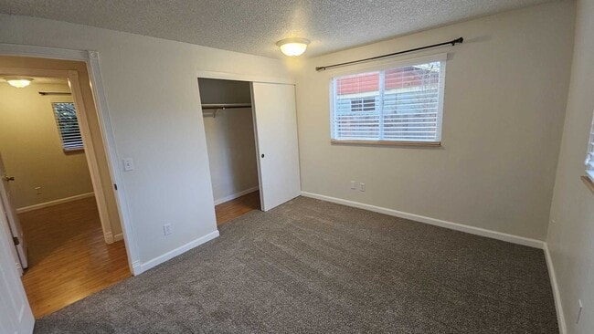 Building Photo - Charming updated 3 bed 1 bath ranch style home with double car garage and large fenced back yard.