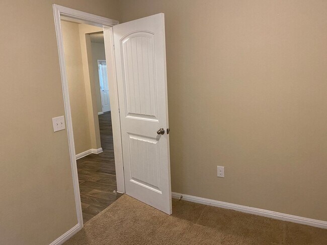 Building Photo - Three Bedroom, Two Bath, Two Car Garage, Washer and Dryer are included.