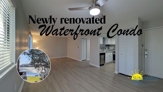 Building Photo - Expansive waterfront covered patio off thi...
