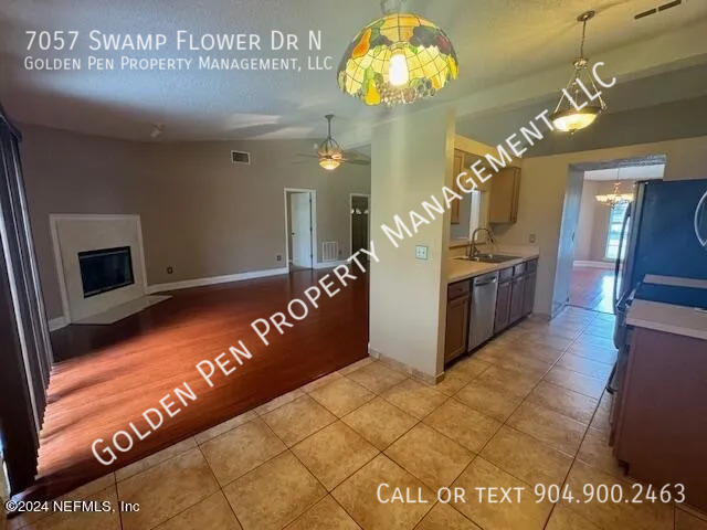 Building Photo - 7057 Swamp Flower Dr N
