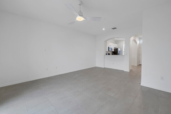 Great Room into kitchen - 6111 Fairmont Ln