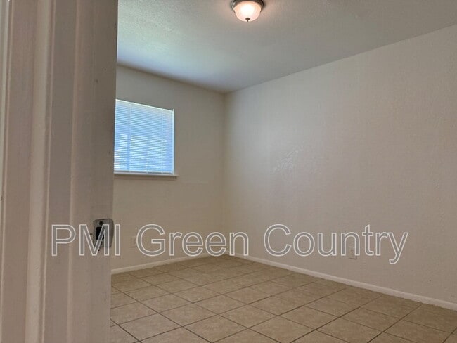 Building Photo - 1412 S 73rd E Ave