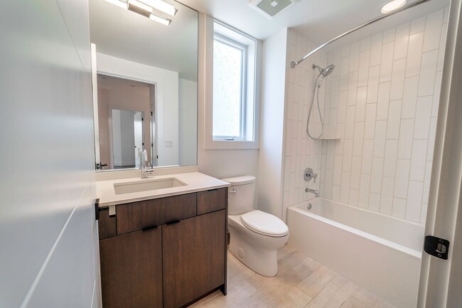 Building Photo - Park Central Townhomes - 4 Stories, 3 bedrooms, 31/2 bathrooms, 2 car garage and a rooftop deck w...