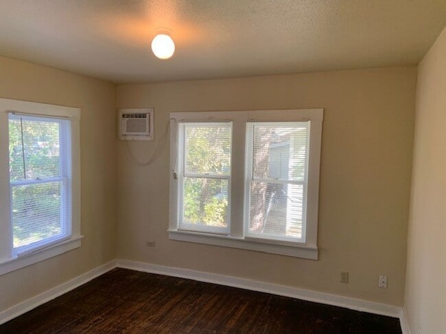 Building Photo - *COMING SOON* Charming Cottage Retreat with Fenced Yard!