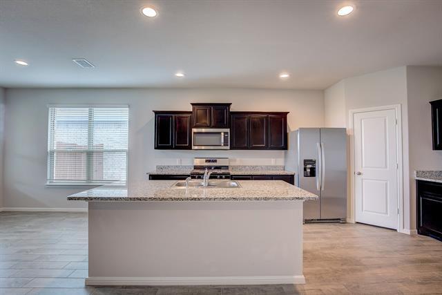 Building Photo - 8504 Wildwest Dr