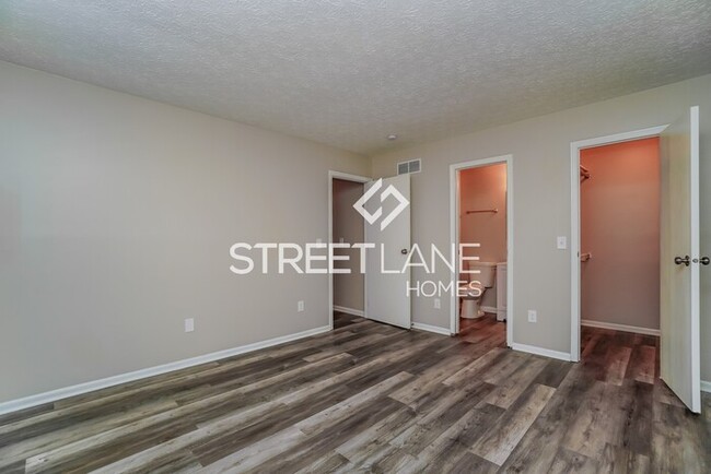 Building Photo - REDUCED- Now offering $1000 off first full...