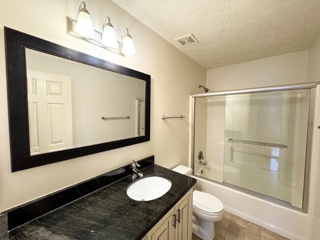 Building Photo - Rare Sugar Hill Rental with Huge Fenced Yard and Outdoor Living Space