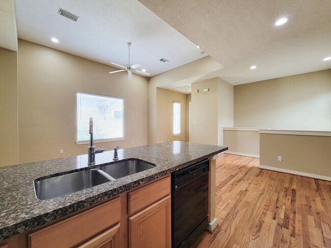 Building Photo - Elegant Gated Townhome Offering Unparallel...