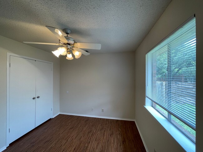 Building Photo - SPACIOUS HOME - NEW FLOORING! - 2 LIVING A...