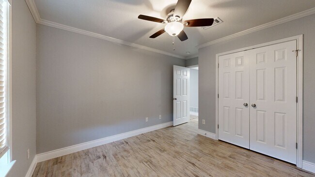Building Photo - Completely repainted 4 bedroom ALL TILE ho...