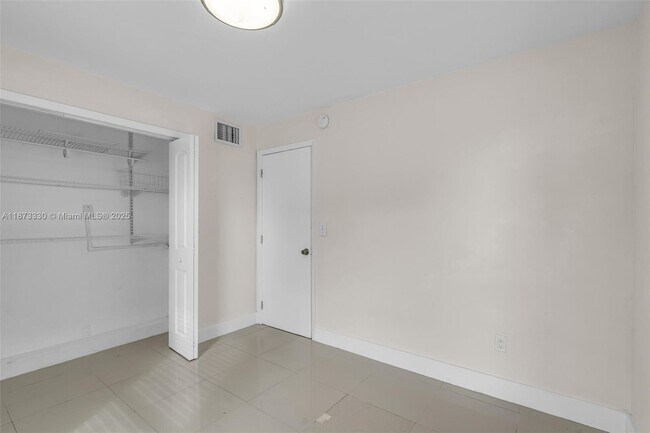 Building Photo - 241 S Royal Poinciana Blvd