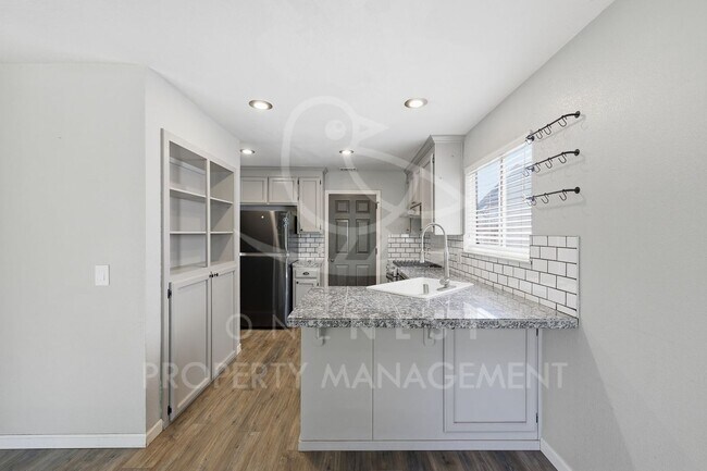 Building Photo - Charming and thoughtfully upgraded 3-bedroom, 2-bathroom single-level