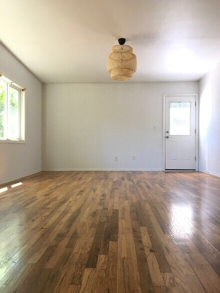 Living room and backdoor - 5427 SE Tibbetts St