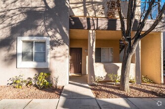 Building Photo - Guard Gated Spanish Palms