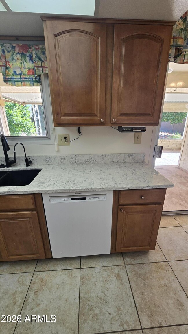 Building Photo - 9839 W Cedar Dr