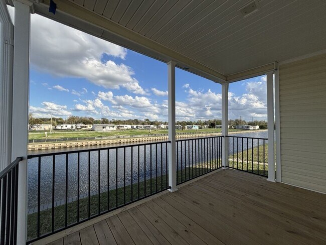 Building Photo - 5646 Blue Harbor Dr