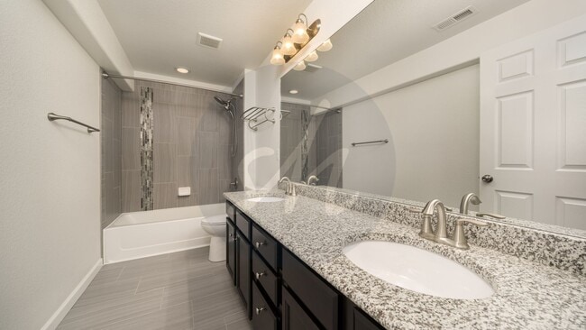 Building Photo - Spacious 4-Bedroom Home with Bonus Room and Full Basement!