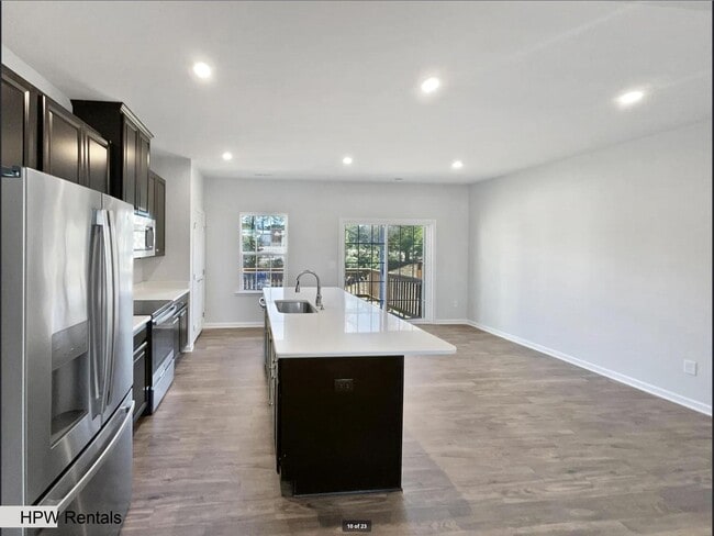 Building Photo - 3-Story End Unit Townhome with 3 Beds, 3 B...