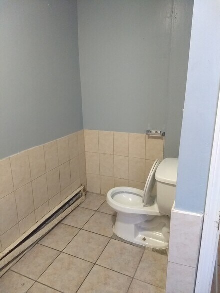 Toilet in bathroom view - 25 Hacker St