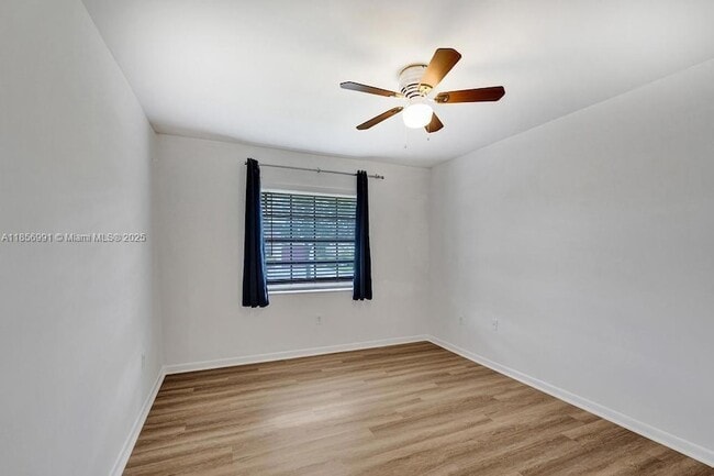 Building Photo - 9540 Sevilla Ln