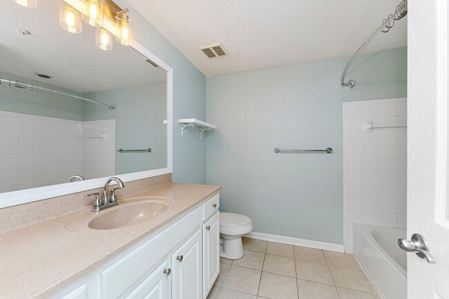 Building Photo - IMMACULATE 2nd Story condominium with so m...