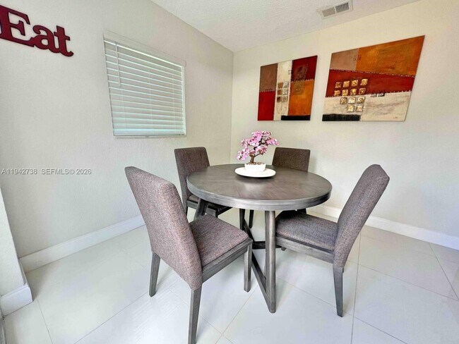 Building Photo - 5249 NE 3rd Ter.