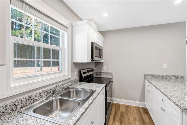 Building Photo - New Construction 3 Bedroom/2 Bathroom Homes with Garage