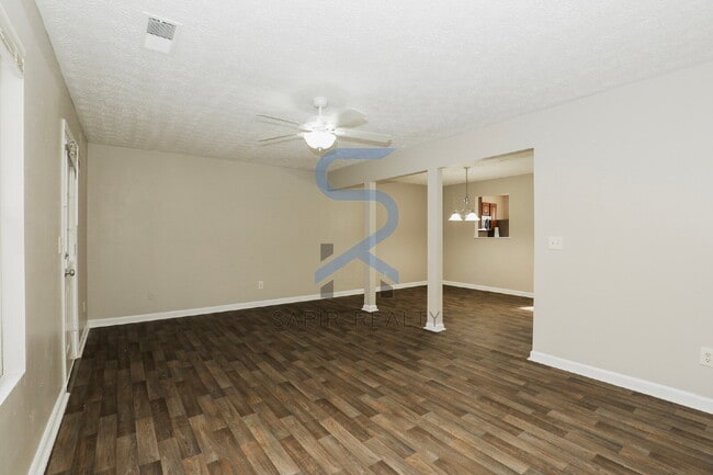 Building Photo - Move in before February 28th and choose your reward: a $250 Amazon Gift Card or a 55" Smart TV!