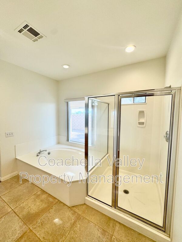 Building Photo - 74091 Daisy Ln
