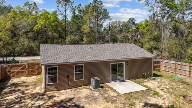 Building Photo - *** NOT READY FOR SHOW OR MOVE IN UNTIL AUGUST 1 *** Newer 3/2 in the country with fenced yard an...