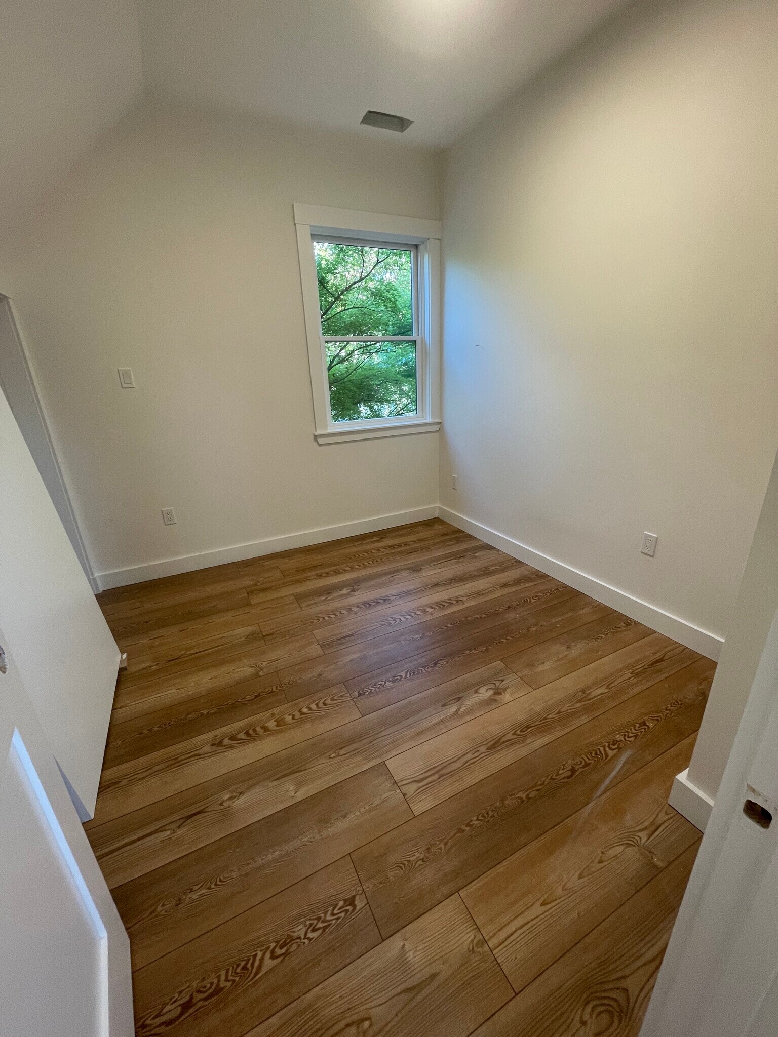 Bedroom with double closet and space for dresser - 19 Haskell St