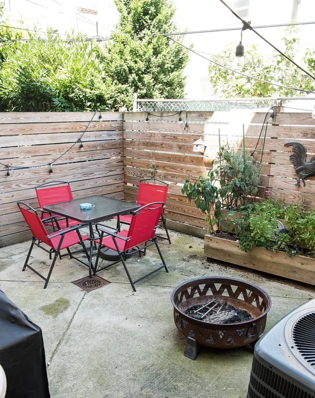 Backyard with patio set and grill - 1623 Swain St