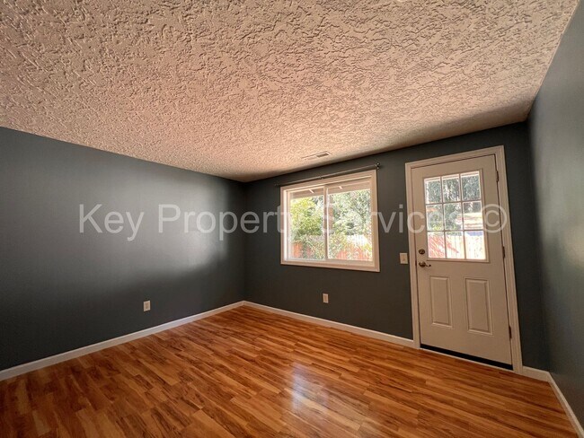 Building Photo - Orchards Ranch with Large Fenced Yard - Re...