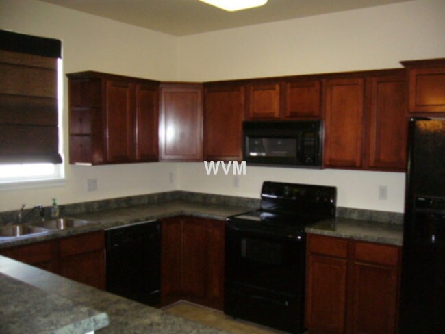 Building Photo - Central Park Townhomes near Iliff and Buckley