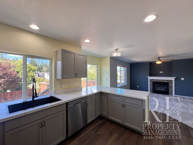 Building Photo - Spacious Bremerton Retreat with Designer Kitchen, Large Fenced Yard & Primary Suite