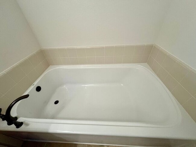 Building Photo - Resort-Style Living with Private Balcony Near Community Pools